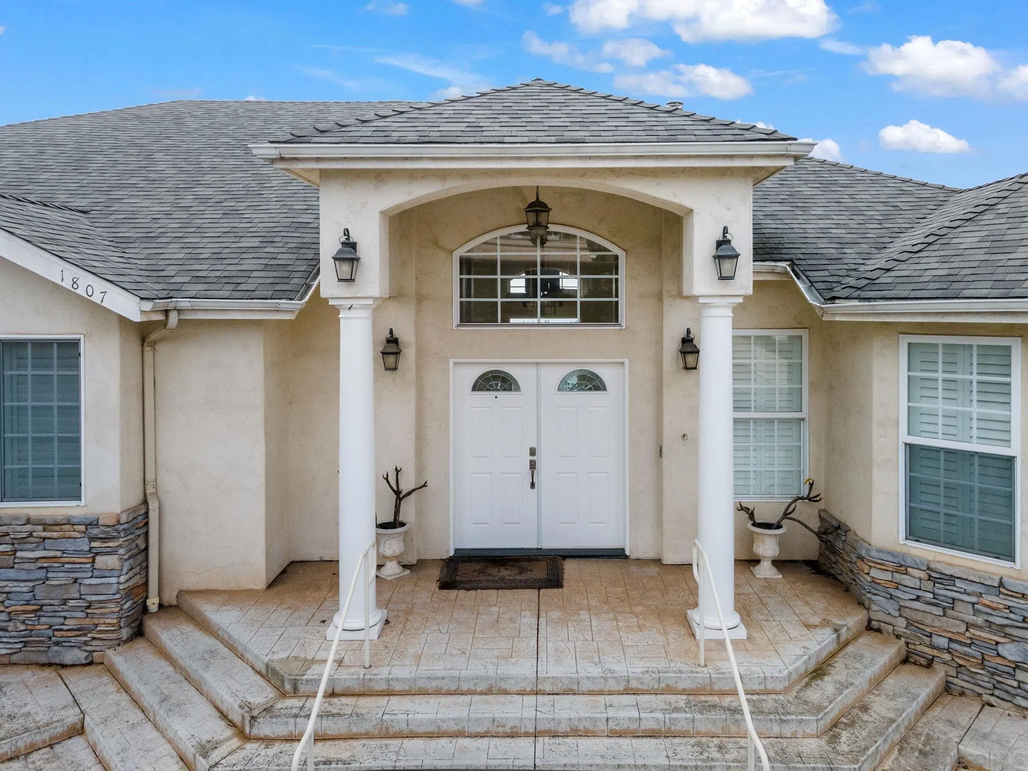1807 Laurel Road Oceanside, CA 92054 - Photo 19 of 67 a front view of a house with parking