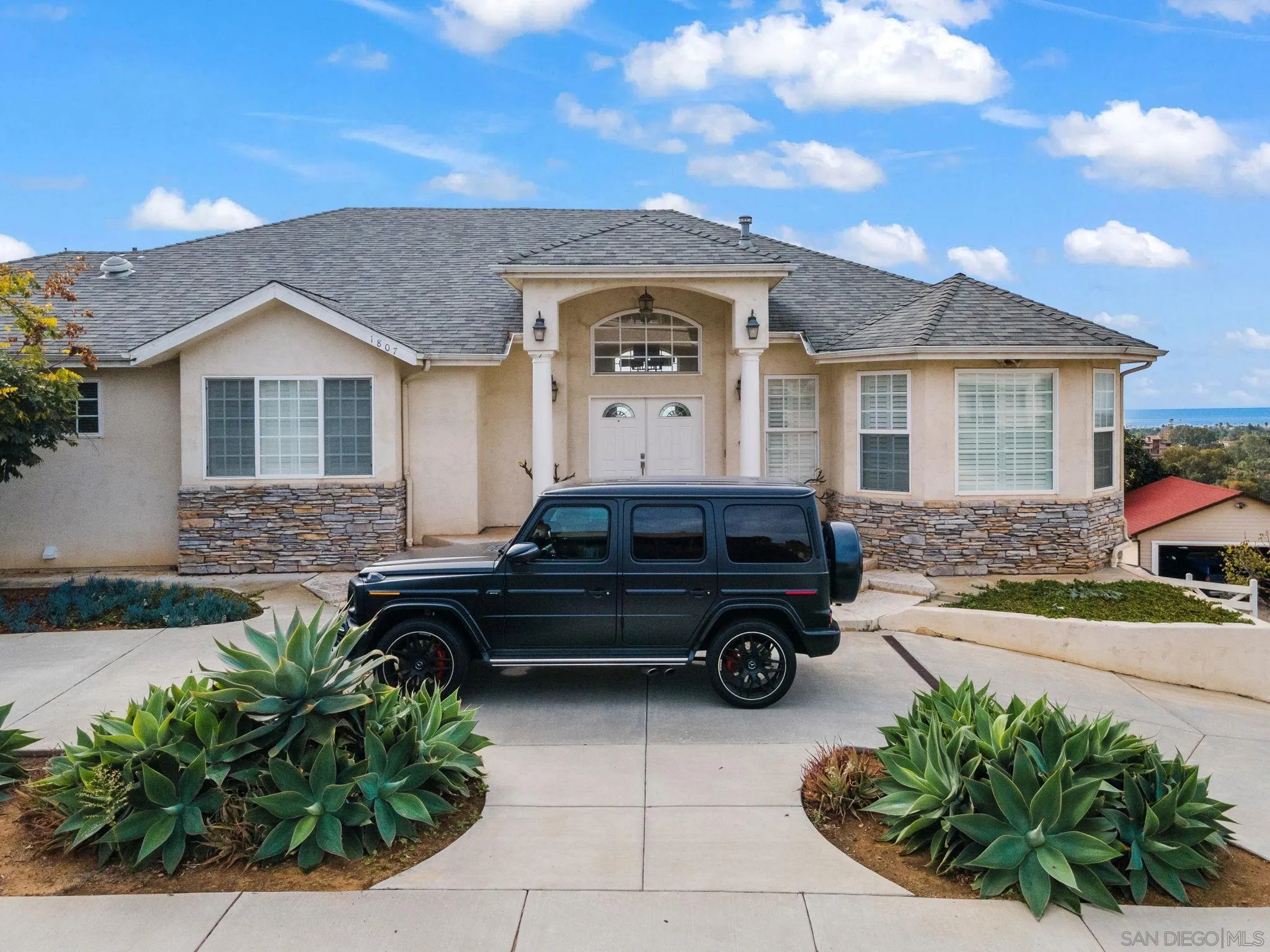 1807 Laurel Road Oceanside, CA 92054 - Photo 21 of 67 a car parked in front of a house