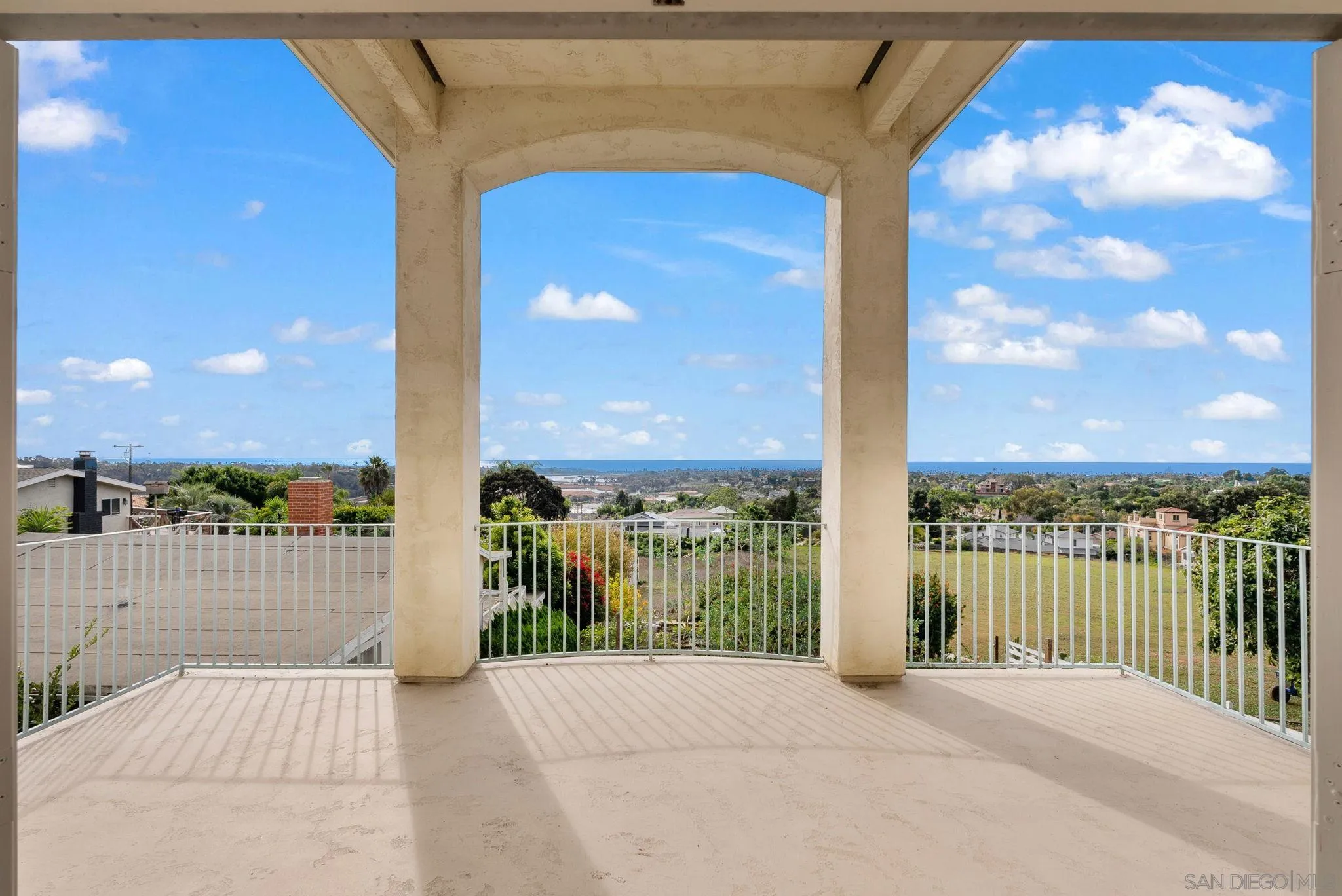 1807 Laurel Road Oceanside, CA 92054 - Photo 37 of 67 a view of a balcony with a floor to ceiling window