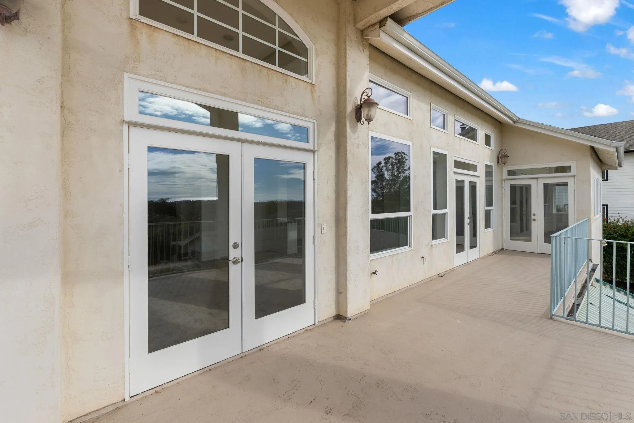 1807 Laurel Road Oceanside, CA 92054 - Photo 42 of 67 a view of a building with glass door