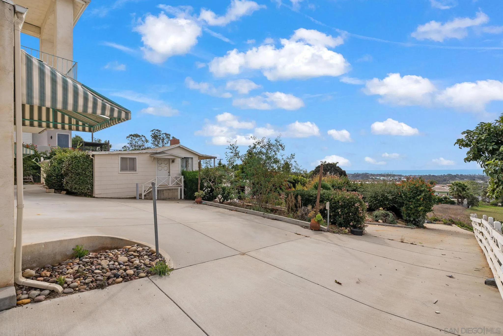 1807 Laurel Road Oceanside, CA 92054 - Photo 52 of 67 a front view of a house with a yard