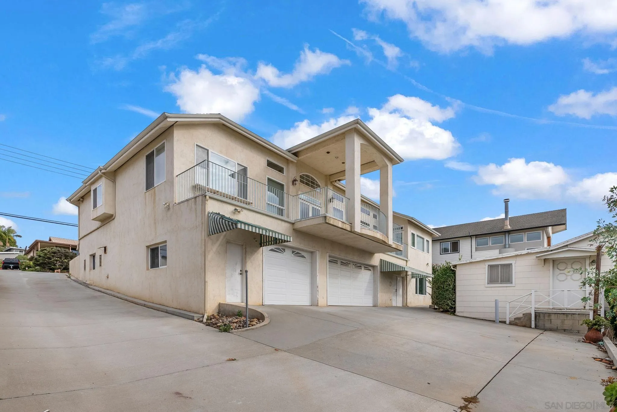 1807 Laurel Road Oceanside, CA 92054 - Photo 53 of 67 a view of a white building among the street with a building in the background