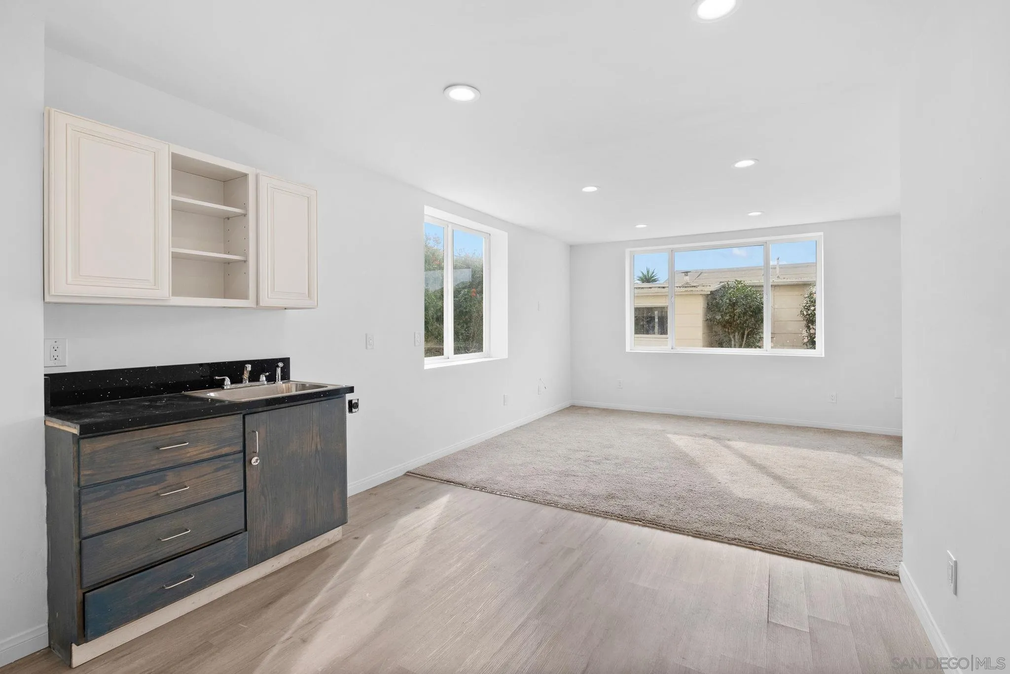 1807 Laurel Road Oceanside, CA 92054 - Photo 61 of 67 a view of an empty room with a window and cabinet