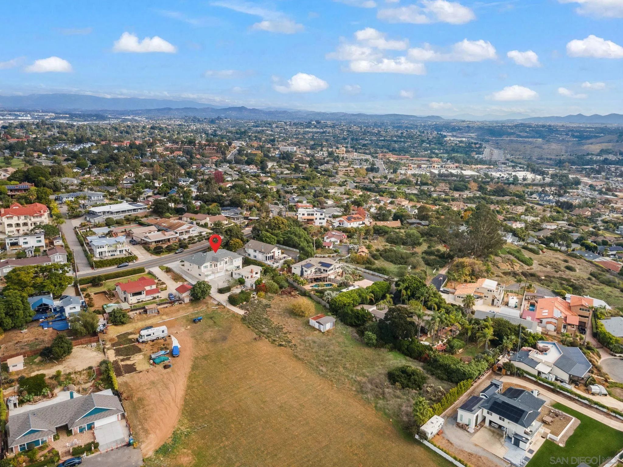 1807 Laurel Road Oceanside, CA 92054 - Photo 10 of 67 an aerial view of residential building with parking
