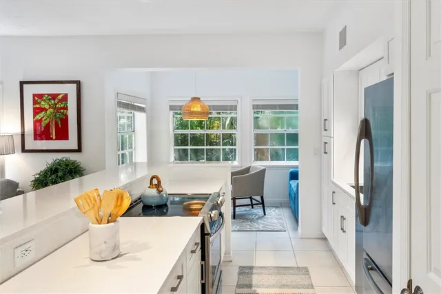 a bathroom with a toilet sink and shower