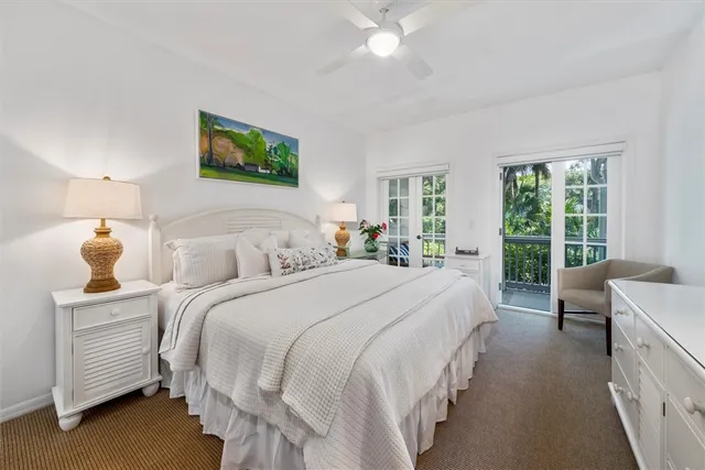 a bed room with a bed and a tv