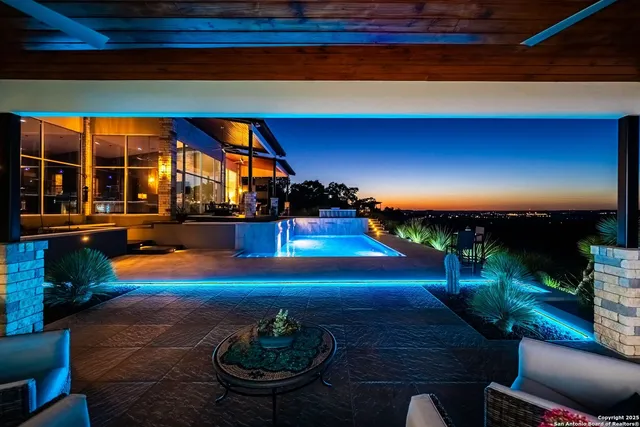 a room with lots of potted plants