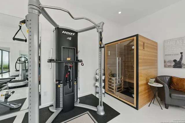 a very nice looking room with gym equipment