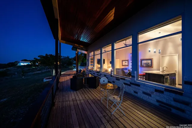 a view of living room with furniture and wooden floor