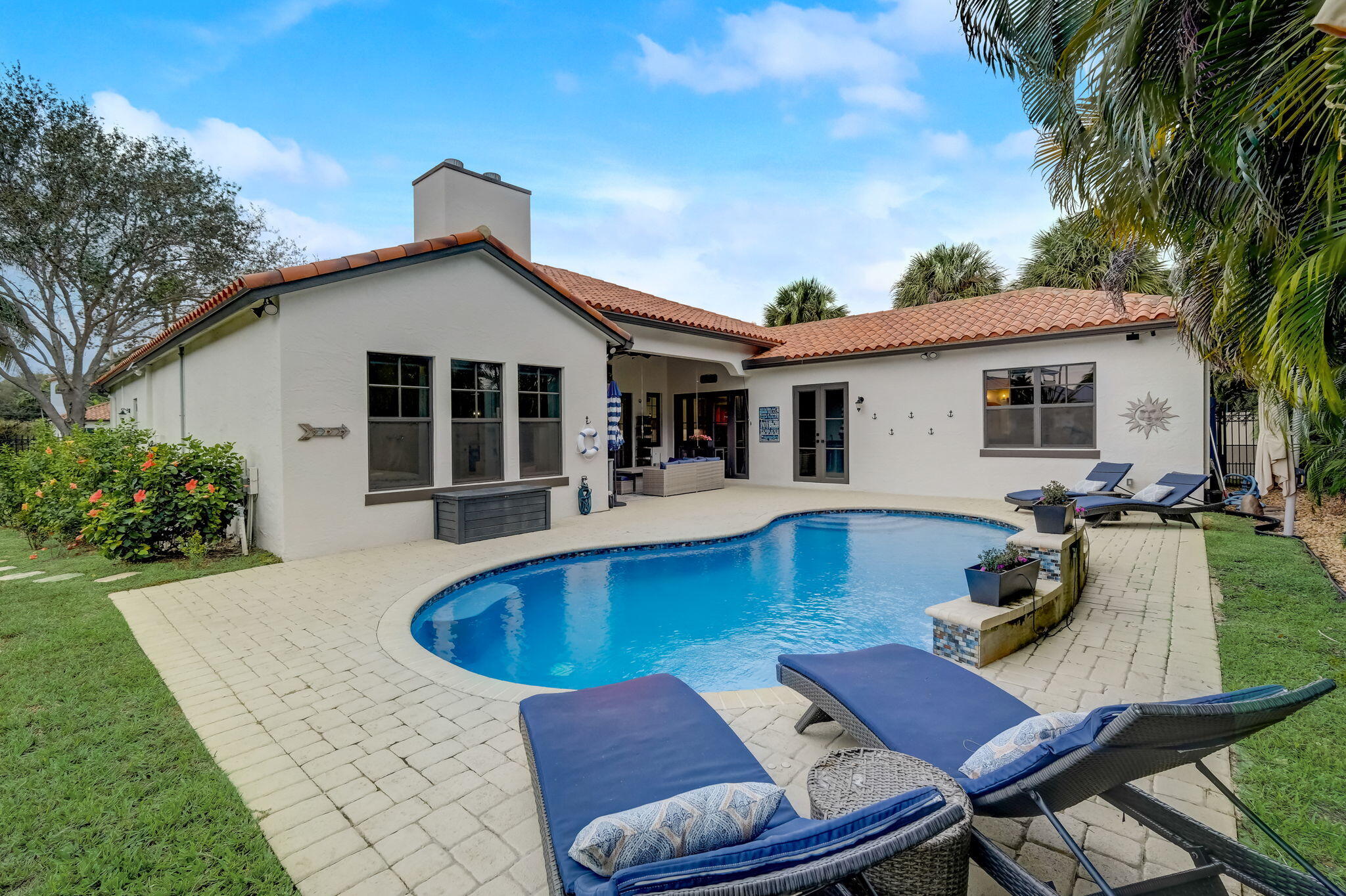 19199 Southeast Daniel Lane Jupiter, FL 33469 - Photo 32 of 49 a view of a house with pool table and chairs