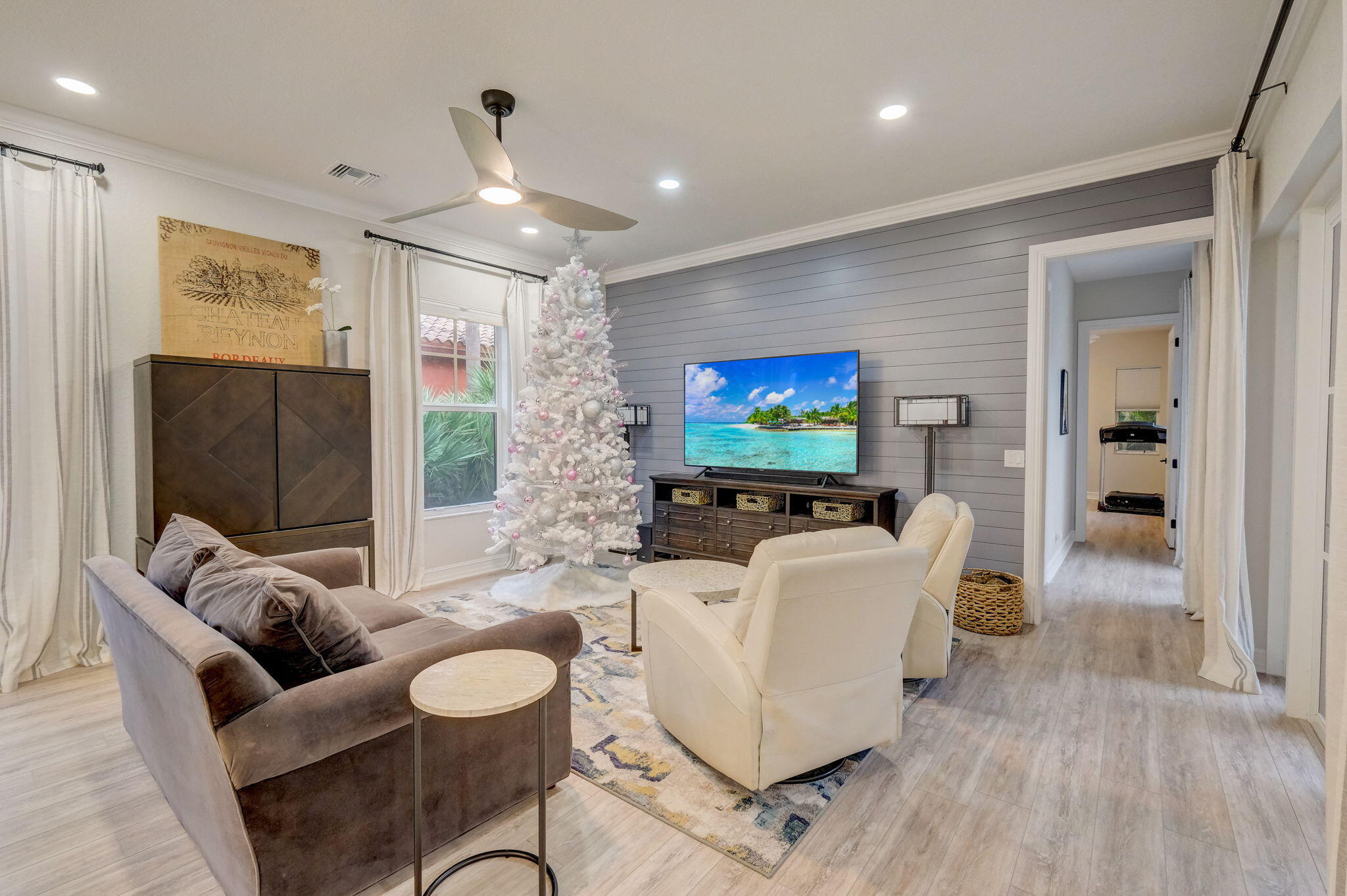 19199 Southeast Daniel Lane Jupiter, FL 33469 - Photo 8 of 49 a living room with furniture and a flat screen tv