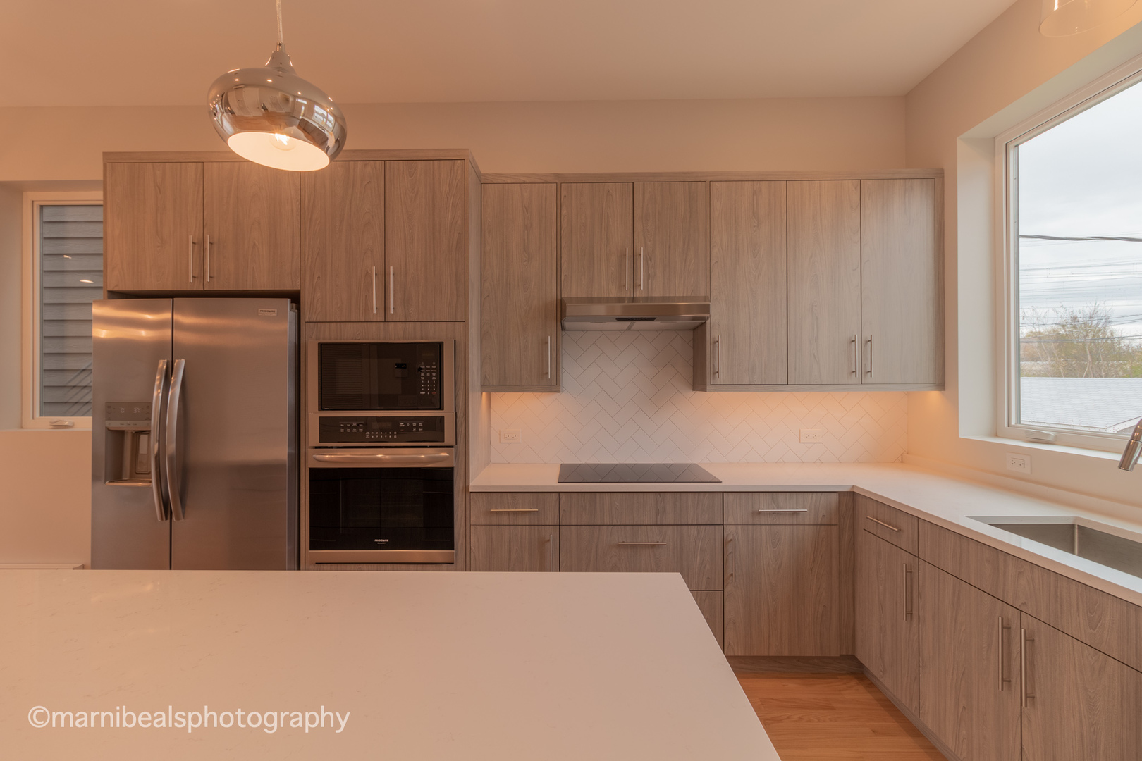 1349 East Marquette Road Chicago, IL 60637 - Photo 3 of 26 a kitchen with a refrigerator sink and cabinets