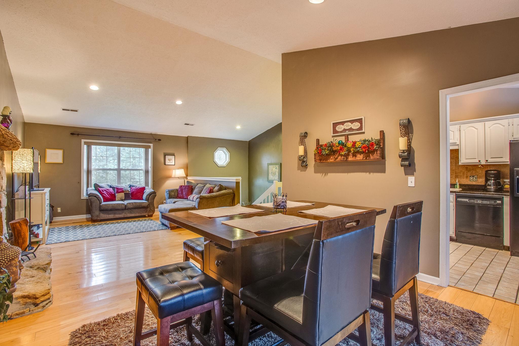 2133 Lee Road Spring Hill, TN 37174 - Photo 6 of 30 a view of a dining room with furniture window and wooden floor