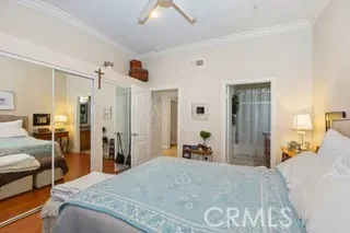 a bed room with a bed and a couch