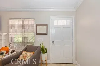 a view of a livingroom with furniture and windows