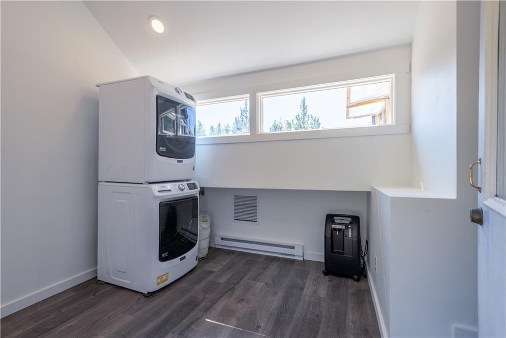 96 L Road Silverthorne, CO 80498 - Photo 12 of 35 a utility room with cabinets dryer and washer