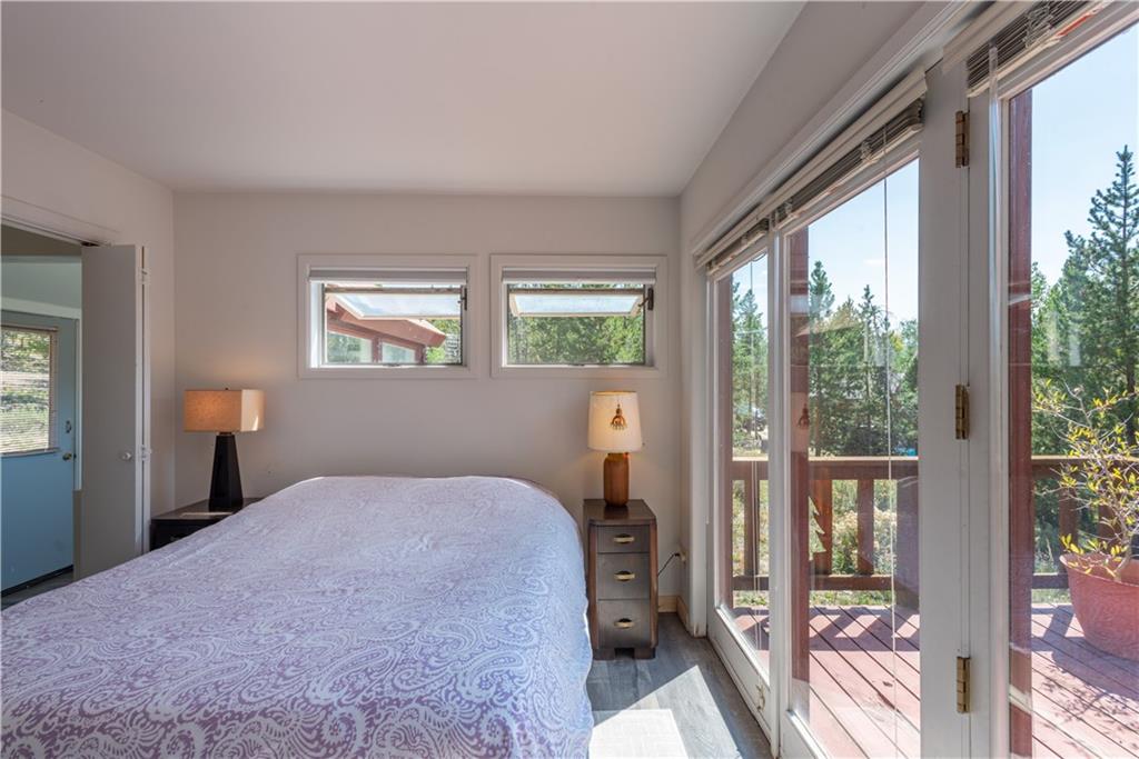 96 L Road Silverthorne, CO 80498 - Photo 14 of 35 a bedroom with a bed and a large window