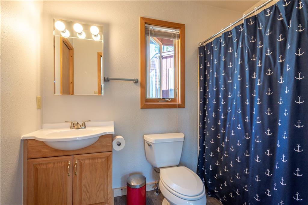 96 L Road Silverthorne, CO 80498 - Photo 24 of 35 a white toilet sitting next to a bathroom sink