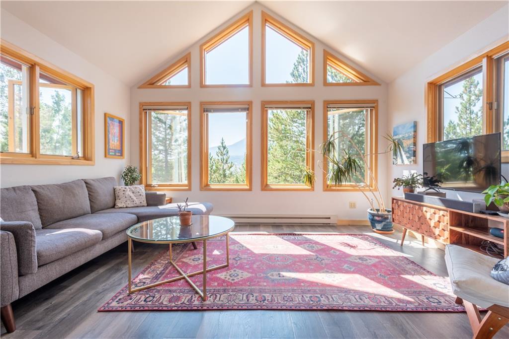 96 L Road Silverthorne, CO 80498 - Photo 6 of 35 a living room with furniture and a large window