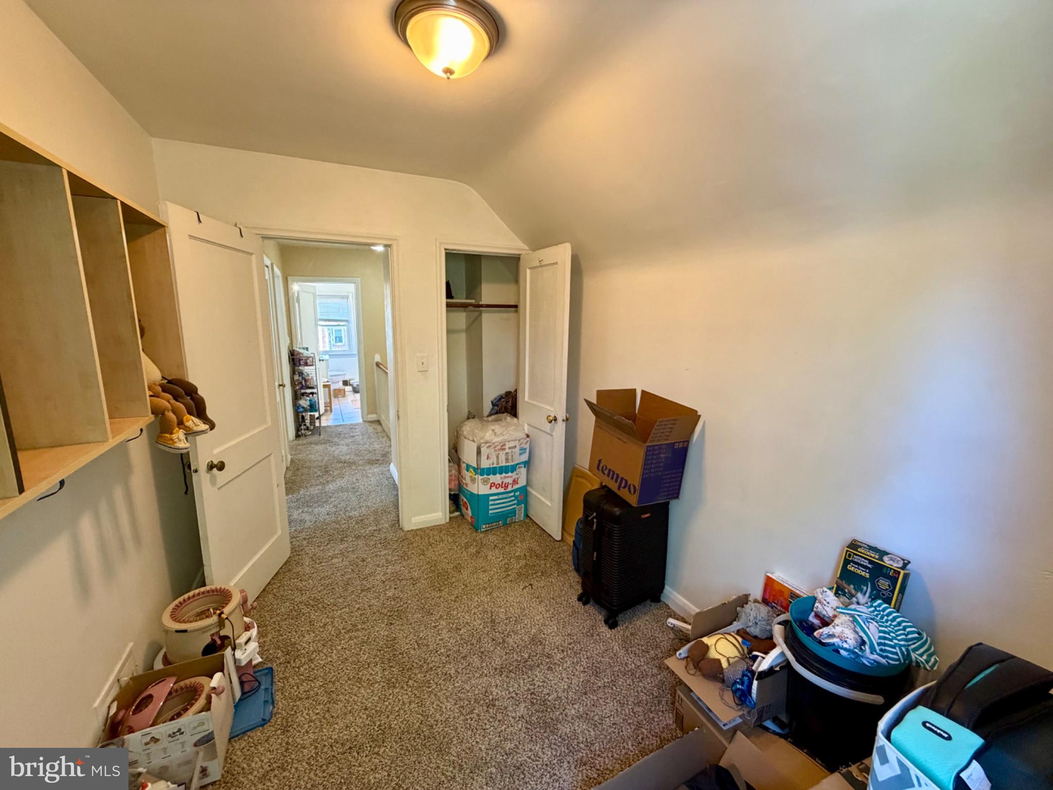 601 Braeside Road Baltimore, MD 21229 - Photo 11 of 19 a view of a workspace with furniture and a window