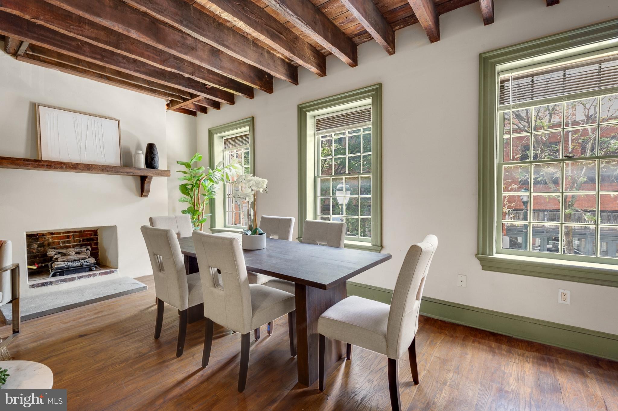 149 North 3rd Street, Unit 2 Philadelphia, PA 19106 - Photo 8 of 44 a view of a dining room with furniture window and wooden floor