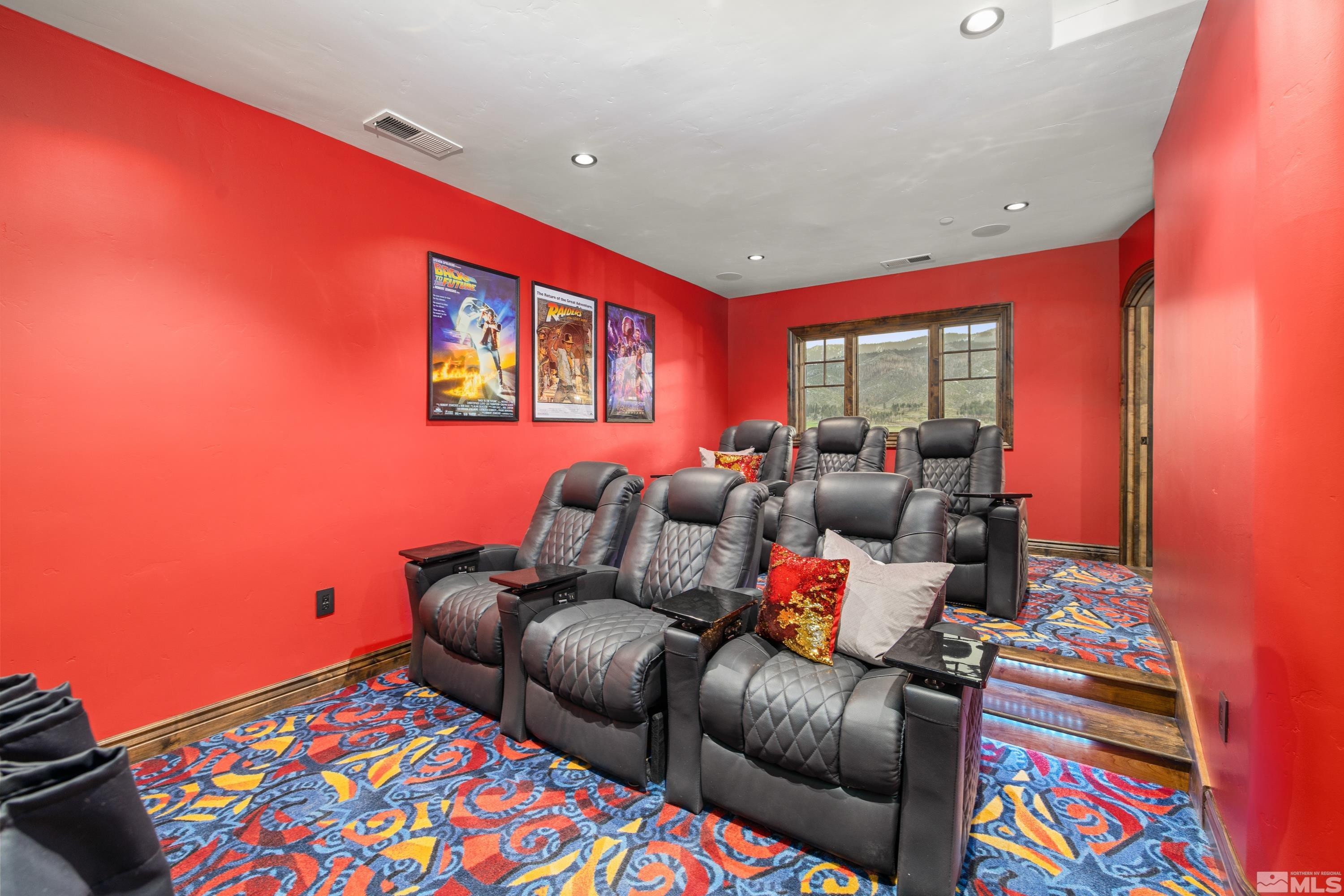 18250 Lake Vista Road Washoe Valley, NV 89704 - Photo 28 of 40 a media room with lots of chairs and a projector screen