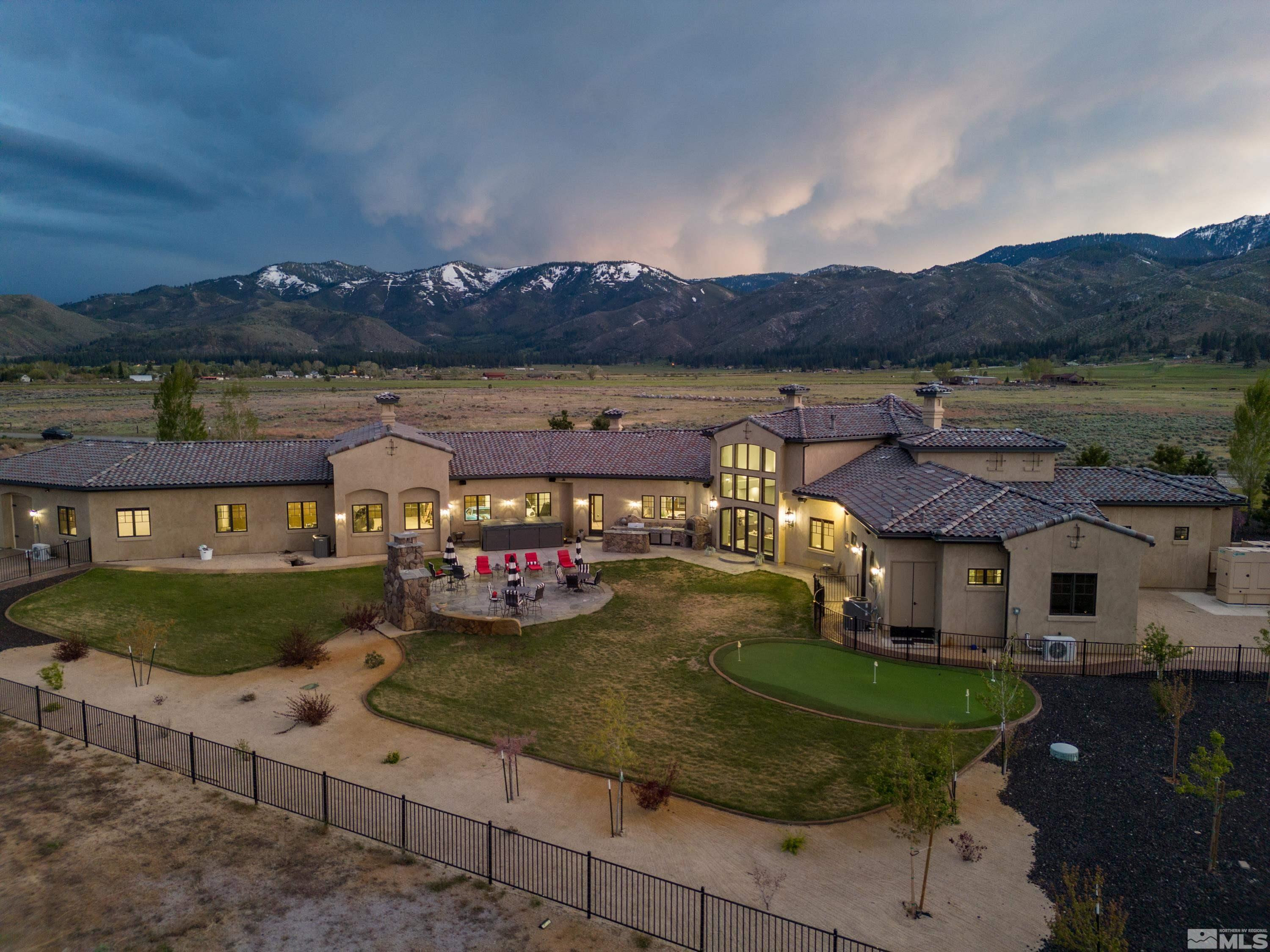 18250 Lake Vista Road Washoe Valley, NV 89704 - Photo 33 of 40 an aerial view of a house with garden and lake view
