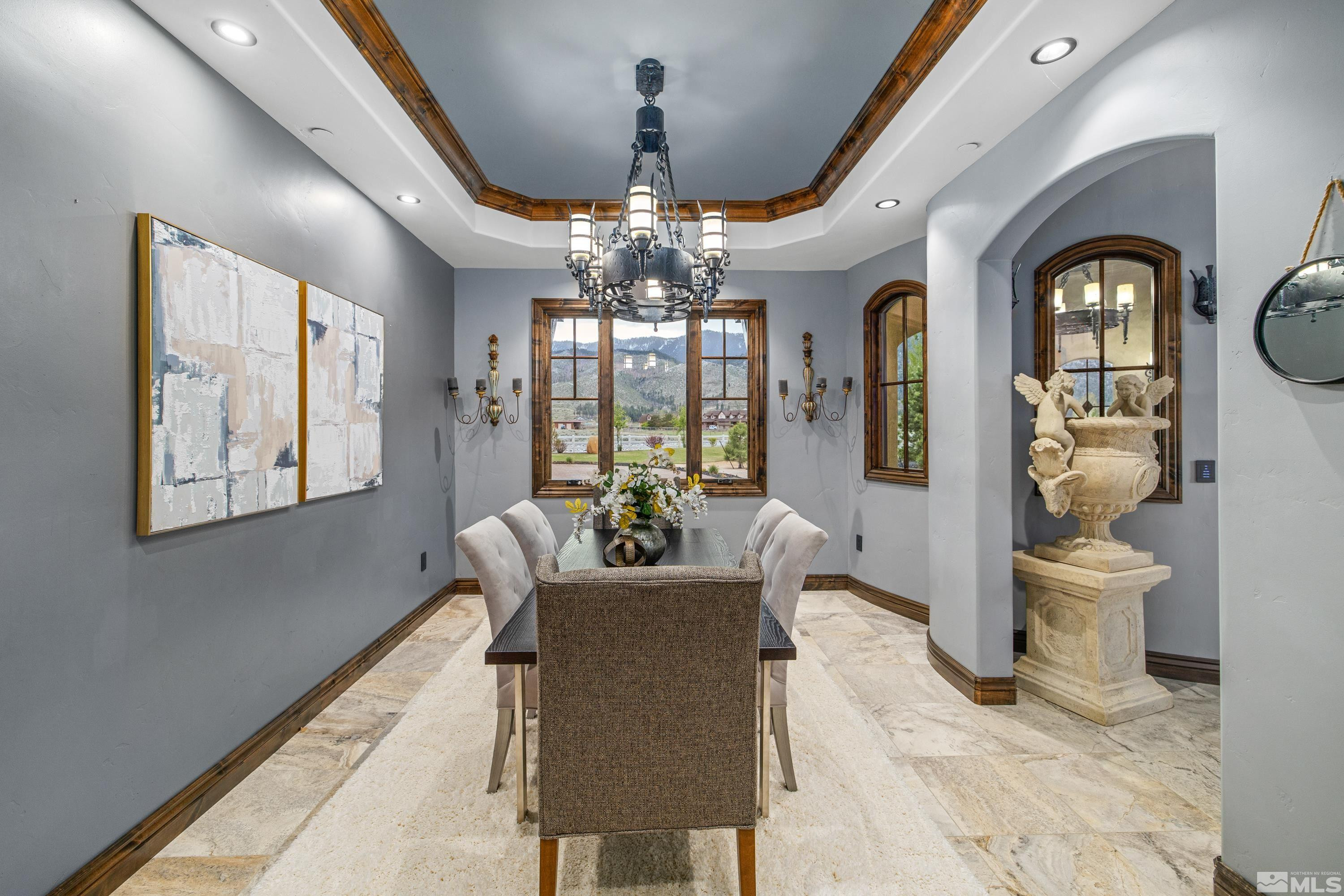 18250 Lake Vista Road Washoe Valley, NV 89704 - Photo 6 of 40 a living room with furniture and a chandelier