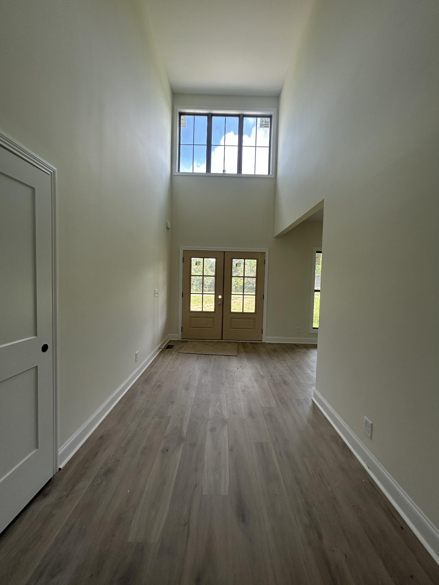 2330 South Hinton Road Southside, TN 37171 - Photo 3 of 17 wooden floor in an empty room with a window