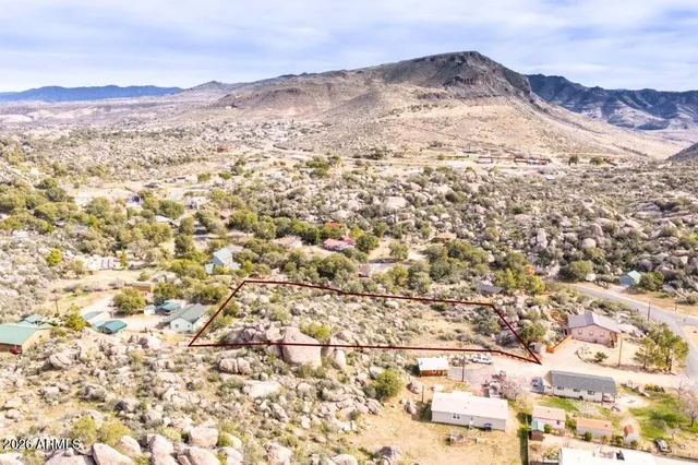 a view of mountains and valleys
