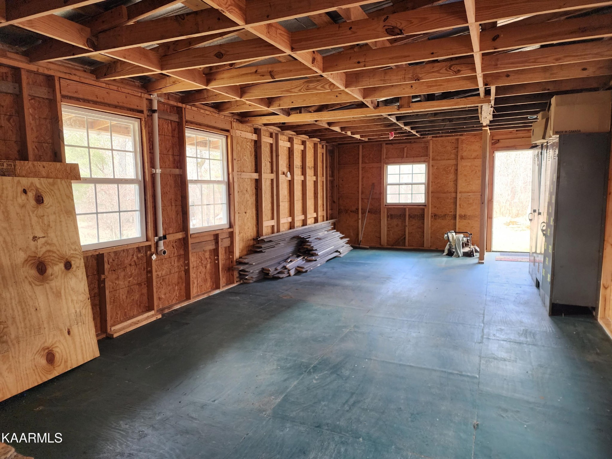 215 Hensley Road Deer Lodge, TN 37726 - Photo 8 of 29 a room with gym equipment and a window