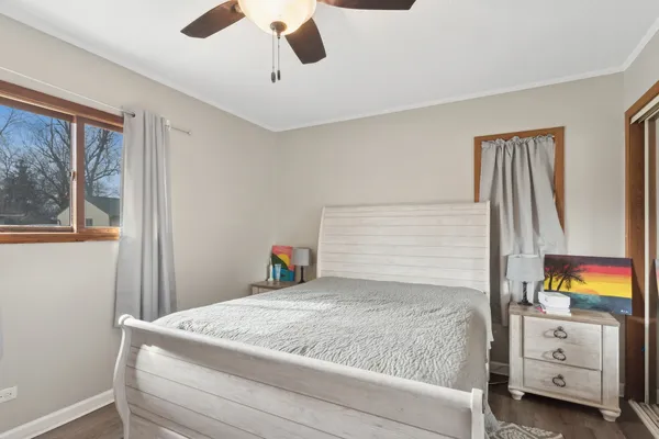 a bedroom with a bed and a cabinets