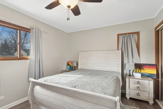 a bedroom with a bed and a cabinets