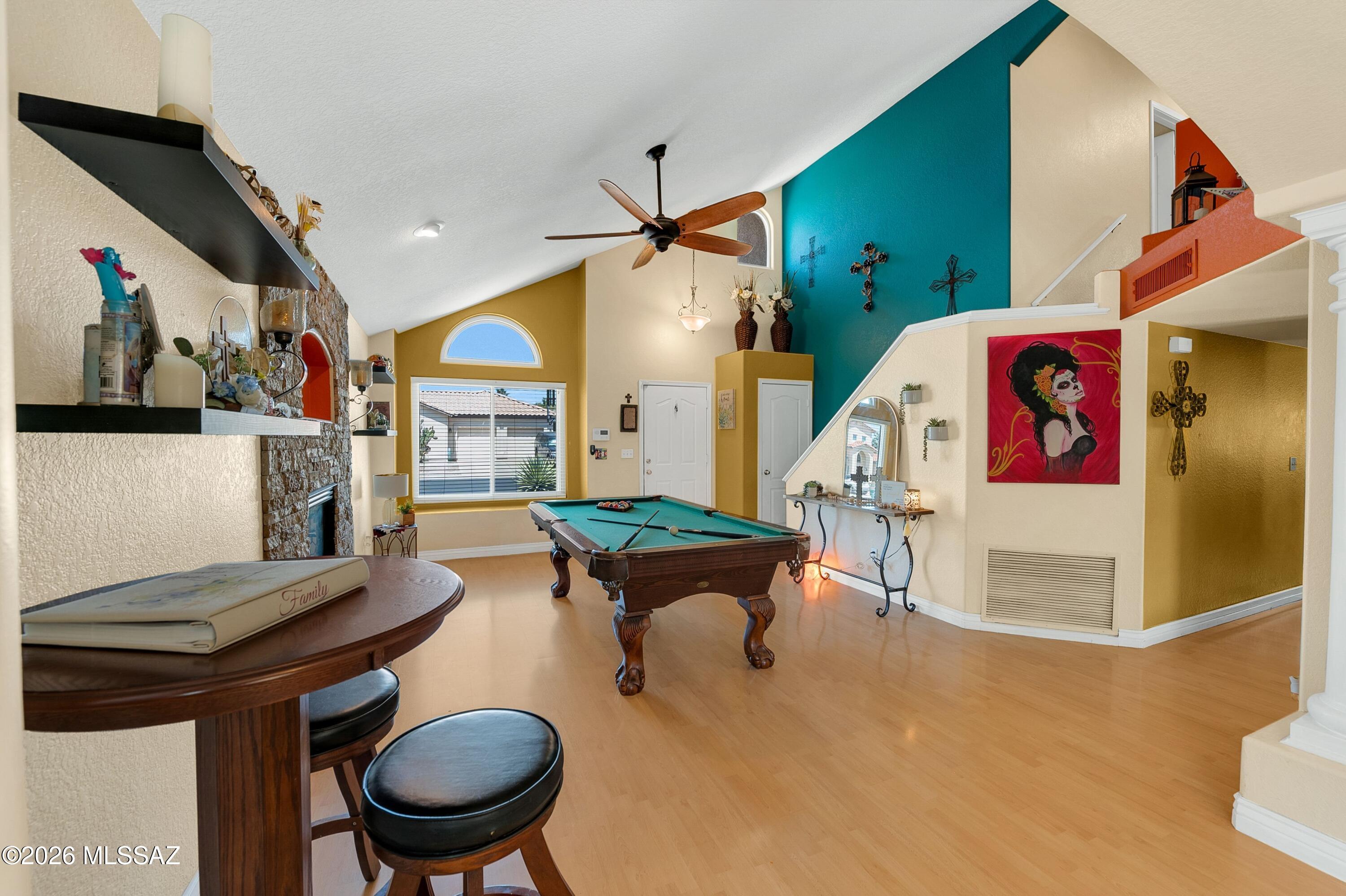 7159 West Maple Ridge Drive Tucson, AZ 85743 - Photo 6 of 42 a living room with furniture and wooden floor
