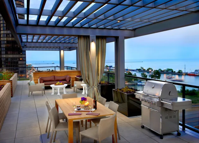 a outdoor space with furniture and flat screen tv