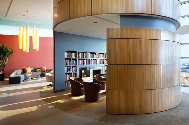 a room with water heater and a cabinet
