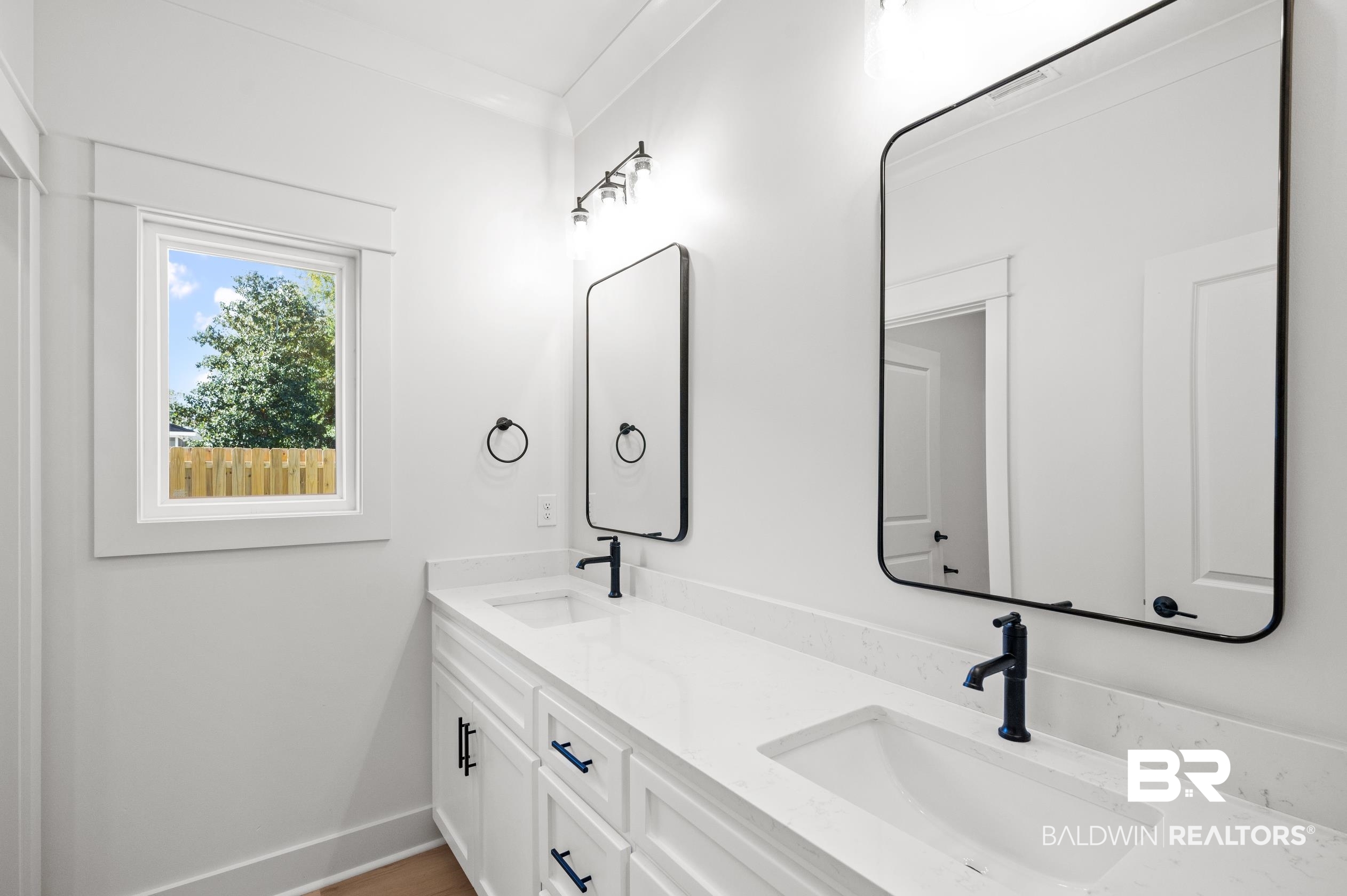 28889 Canal Road Orange Beach, AL 36561 - Photo 21 of 55 Bathroom with vanity and crown molding