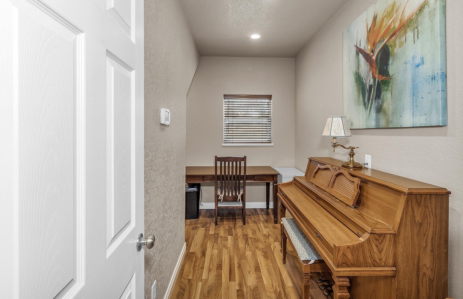 894 25 Road Grand Junction, CO 81505 - Photo 12 of 42 a living room with a bed and furniture