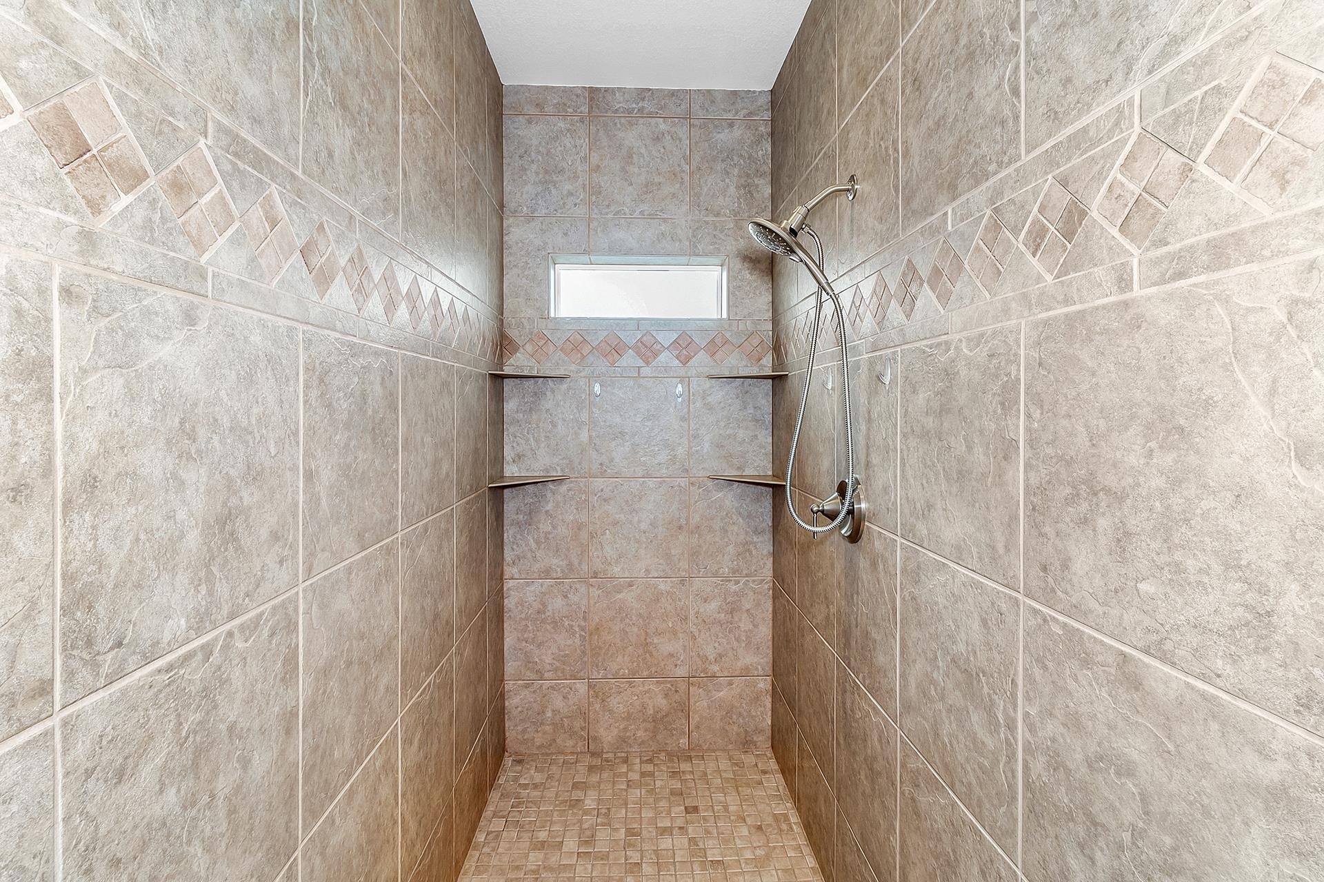 894 25 Road Grand Junction, CO 81505 - Photo 18 of 42 a bathroom with a shower