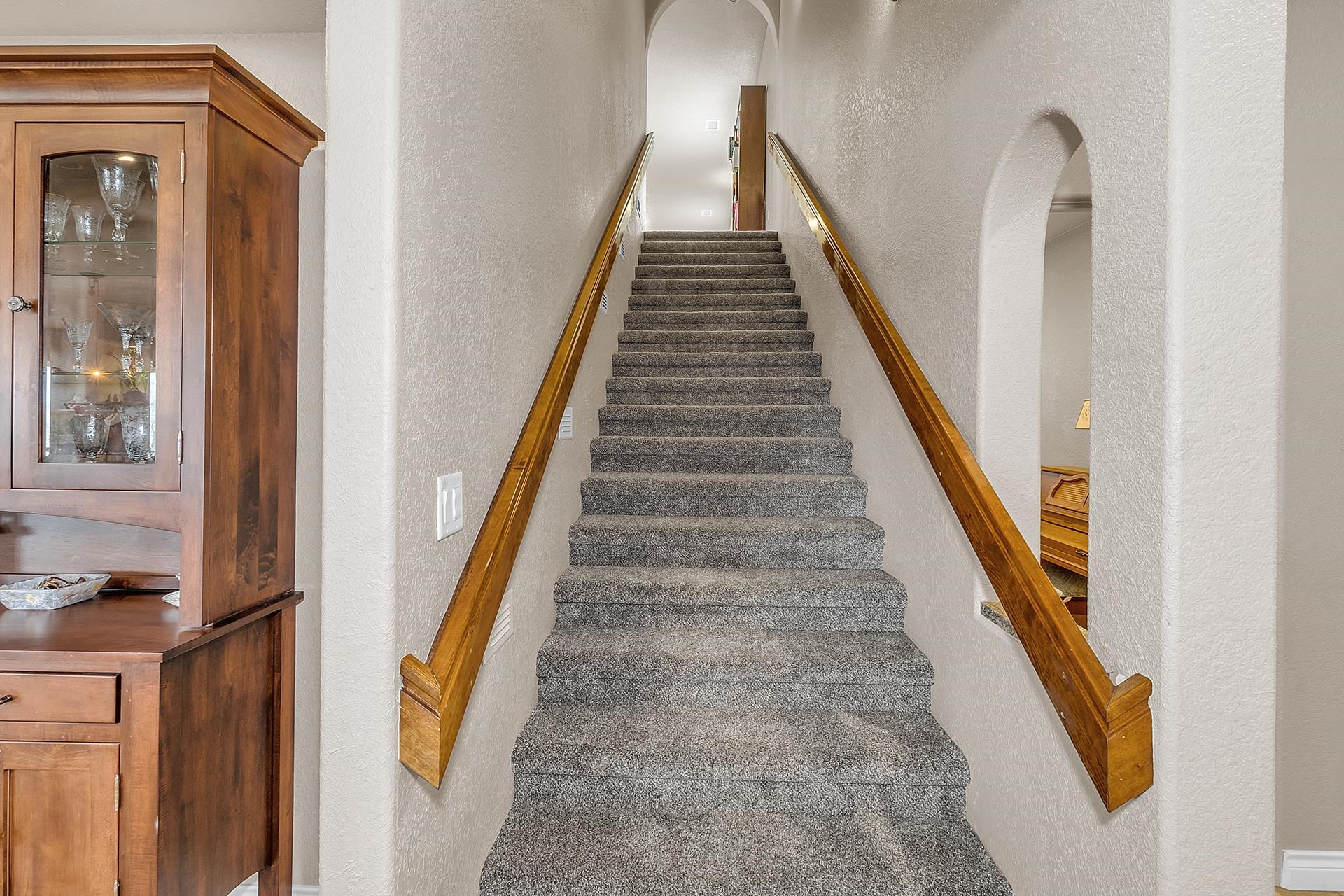 894 25 Road Grand Junction, CO 81505 - Photo 23 of 42 a view of staircase with railing and white walls