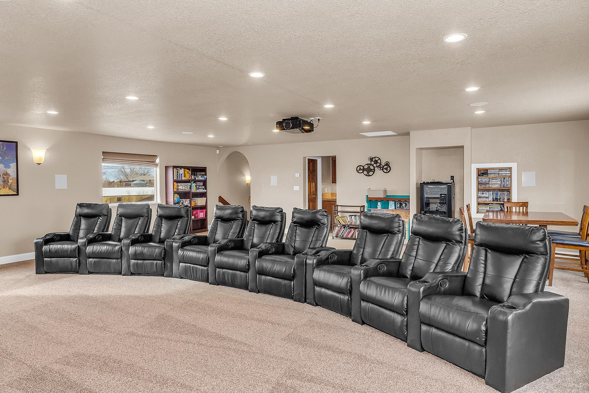 894 25 Road Grand Junction, CO 81505 - Photo 26 of 42 a living room with furniture kitchen view and a wooden floor