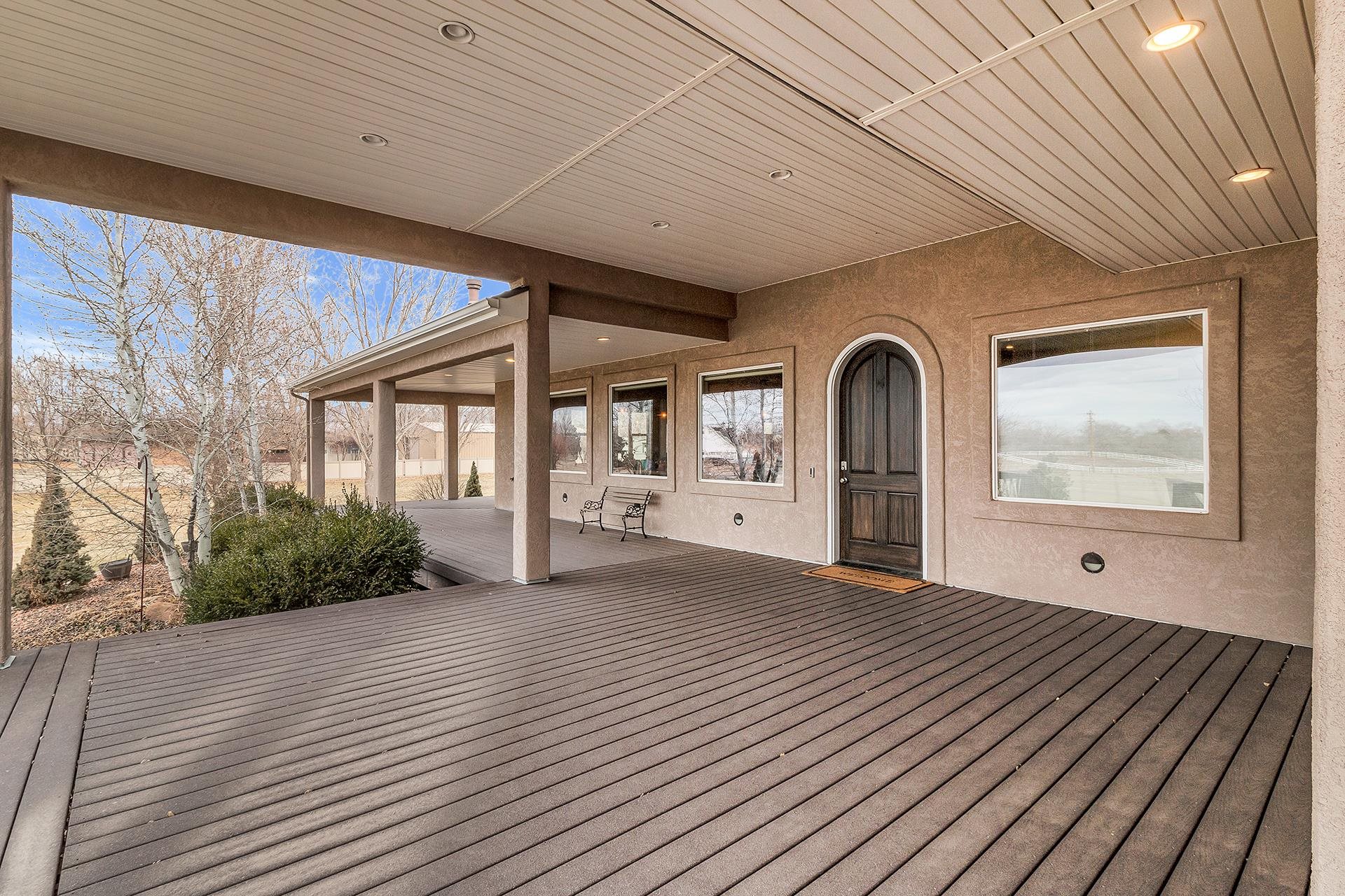 894 25 Road Grand Junction, CO 81505 - Photo 3 of 42 a view of empty room with wooden floor and fan