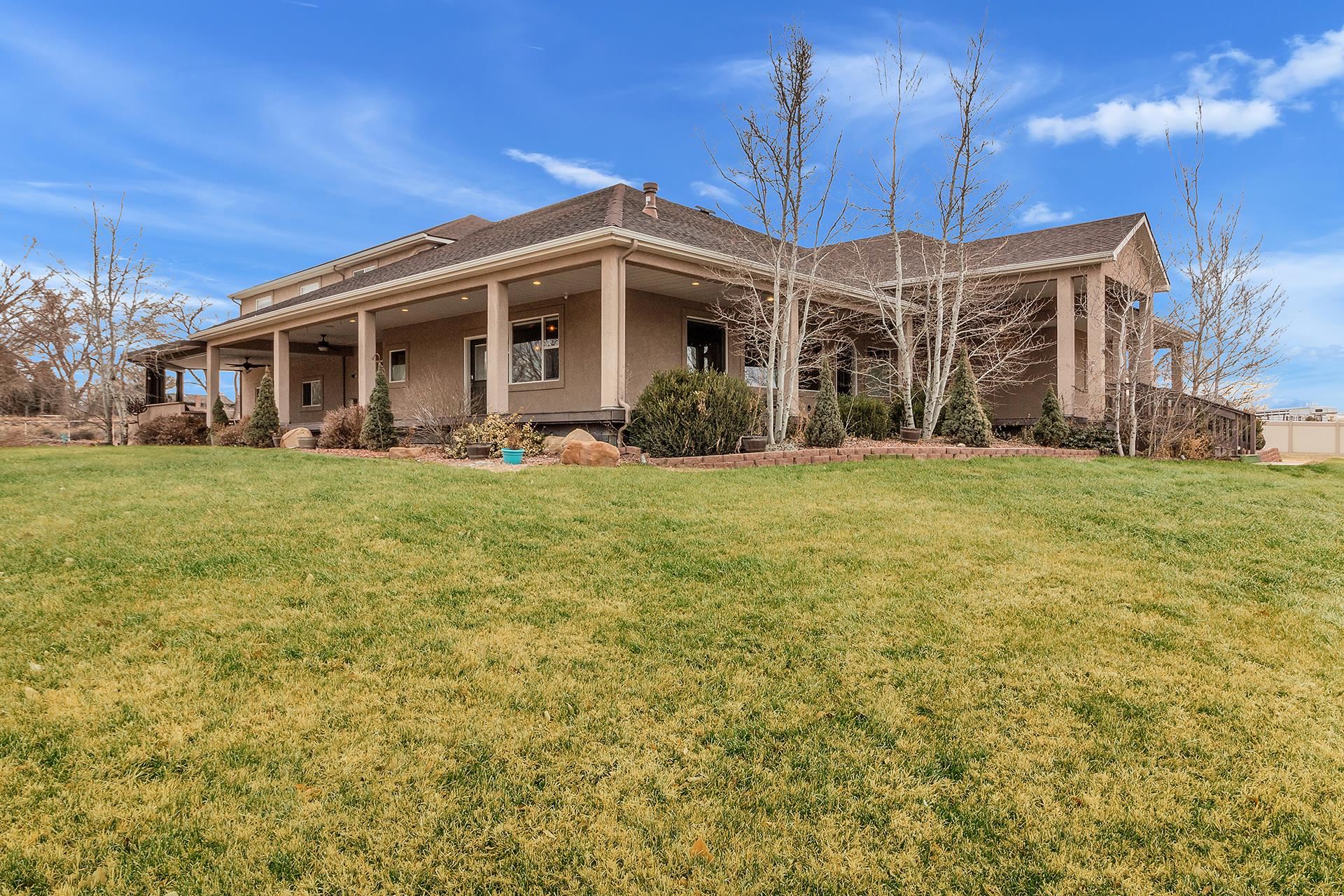 894 25 Road Grand Junction, CO 81505 - Photo 31 of 42 a view of a yard in front of a building
