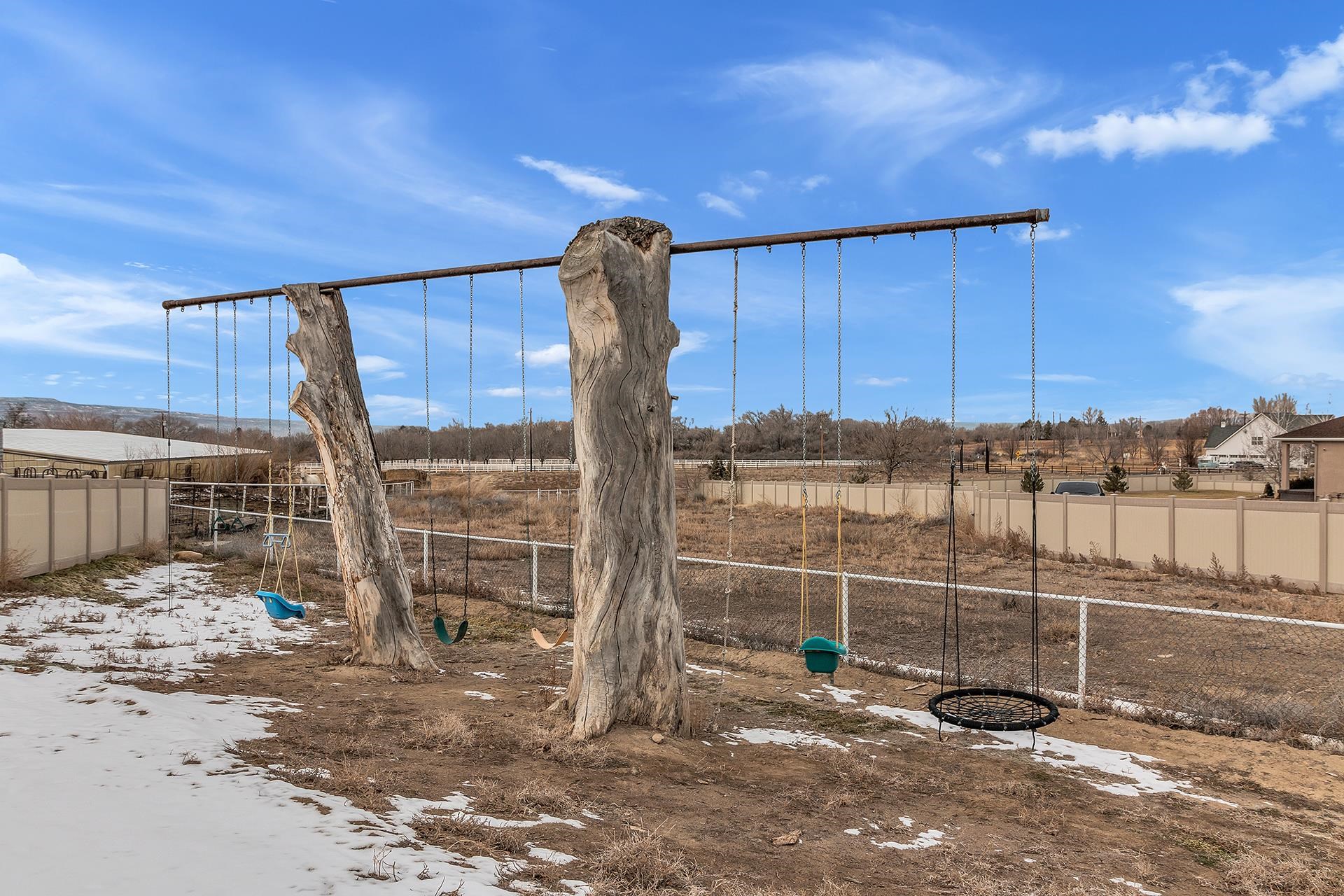 894 25 Road Grand Junction, CO 81505 - Photo 33 of 42 a view of a house with wooden fence