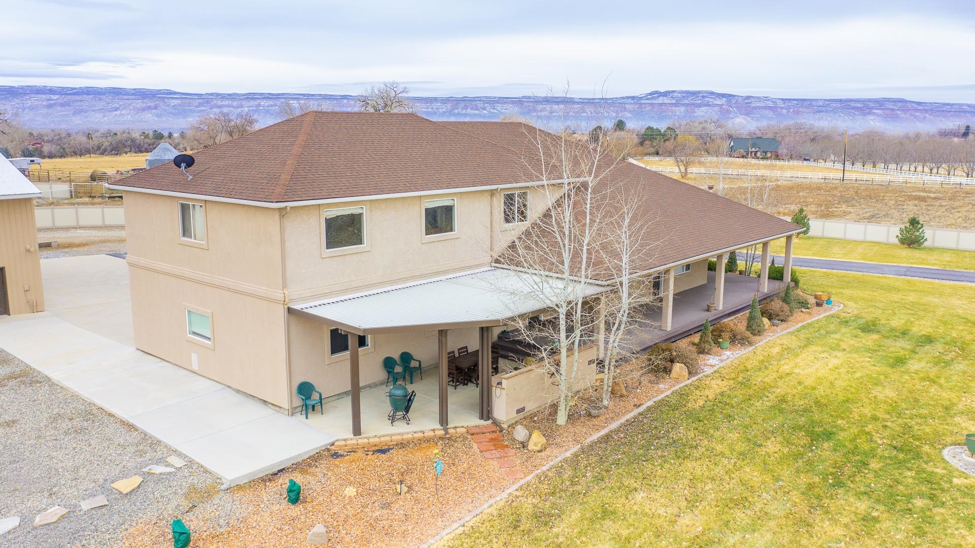 894 25 Road Grand Junction, CO 81505 - Photo 39 of 42 a view of a house with a swimming pool