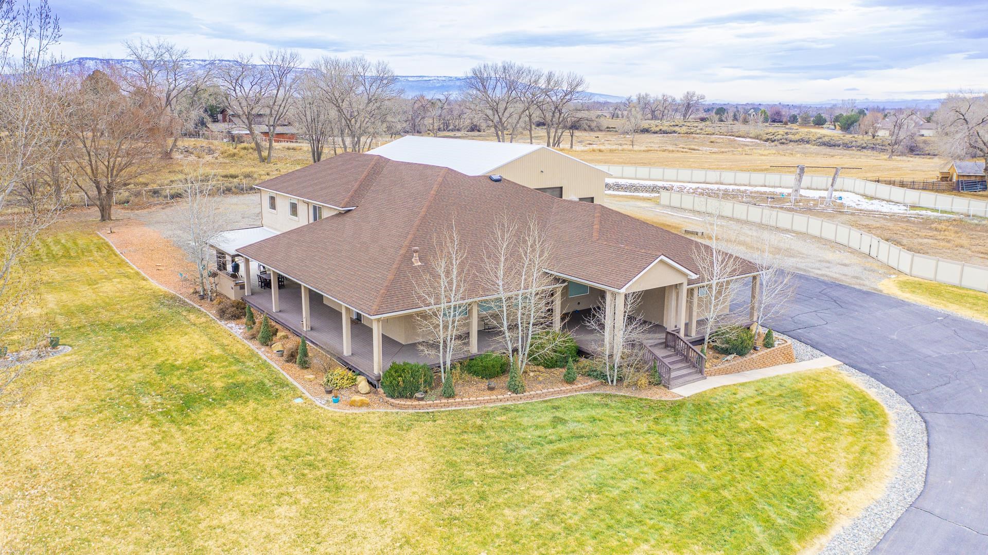 894 25 Road Grand Junction, CO 81505 - Photo 40 of 42 a view of a swimming pool with an ocean view