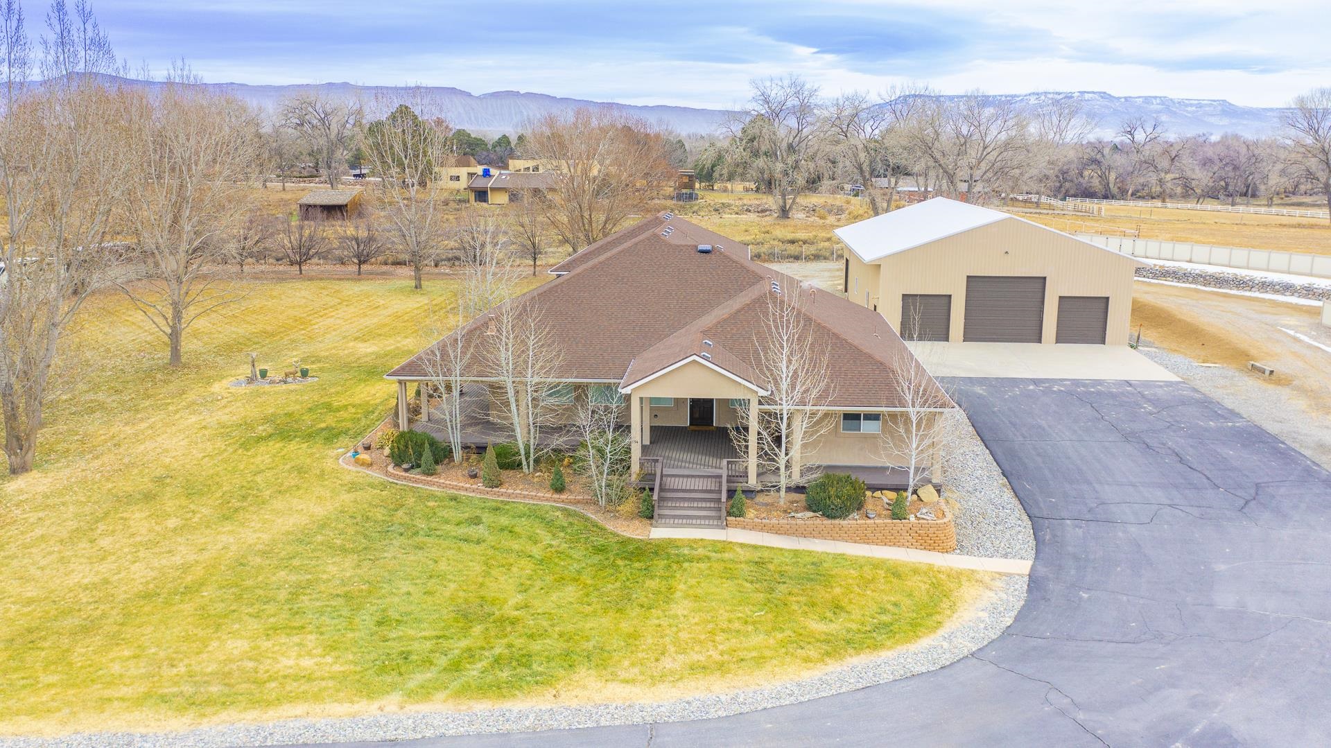 894 25 Road Grand Junction, CO 81505 - Photo 4 of 42 a view of a swimming pool with an ocean view