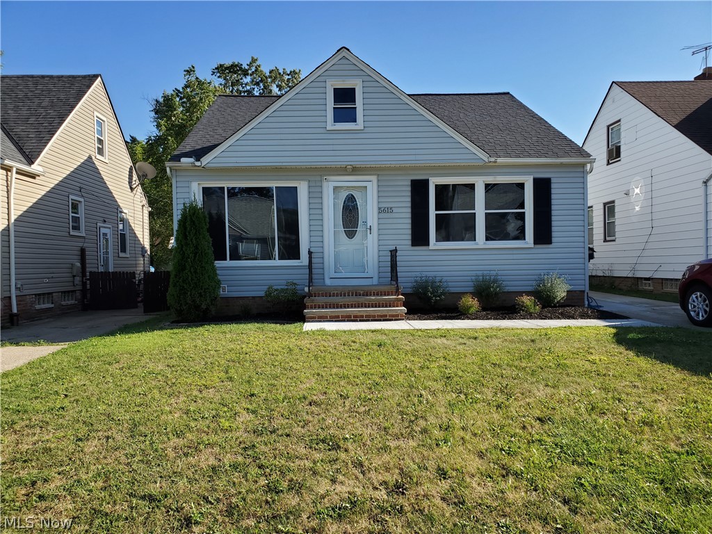 Newer vinyl siding,vinyl windows, roof, walkway,exterior and storm door