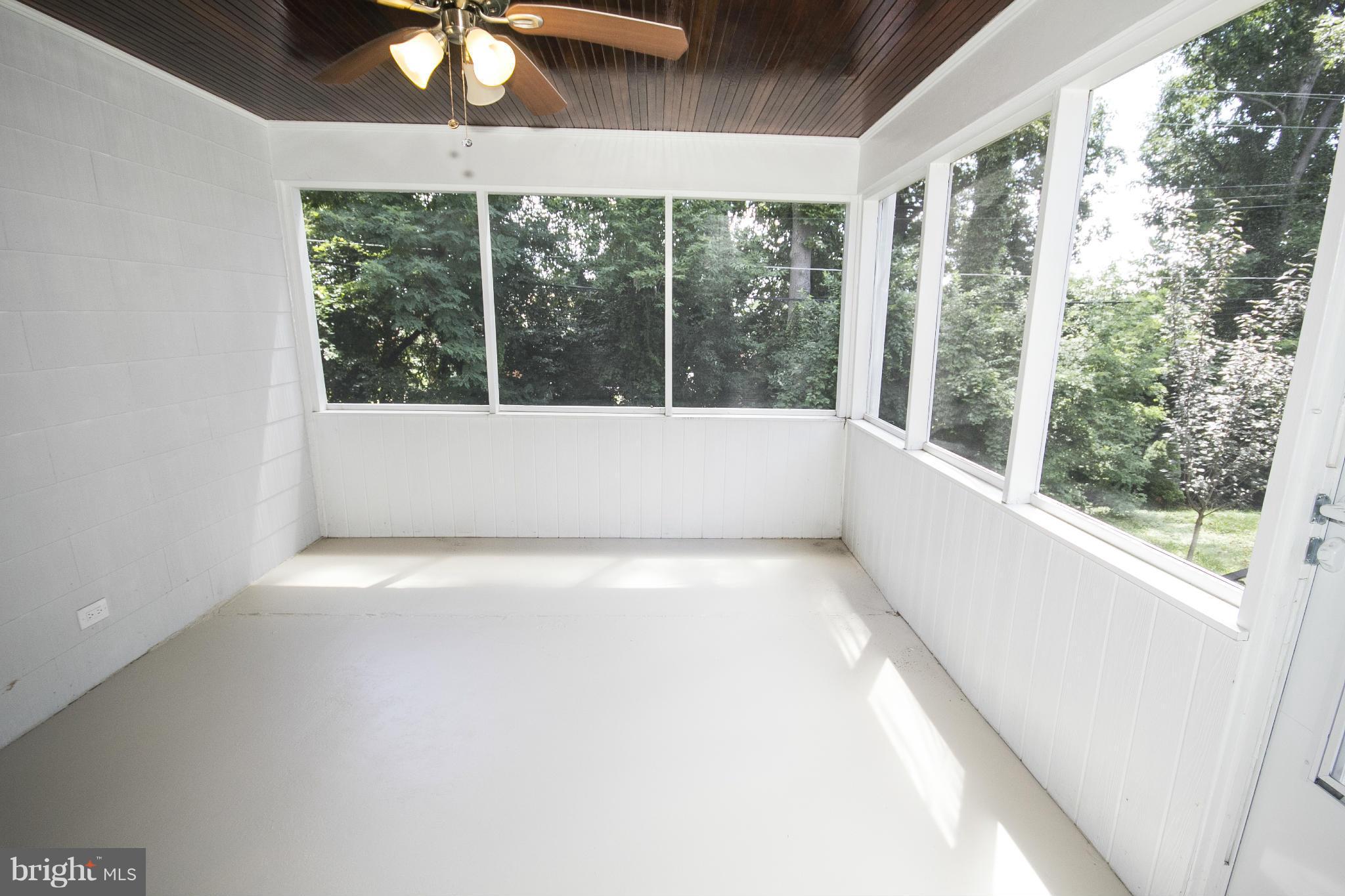 7005 Concord Road Pikesville, MD 21208 - Photo 13 of 29 Screened in Patio off kitchen