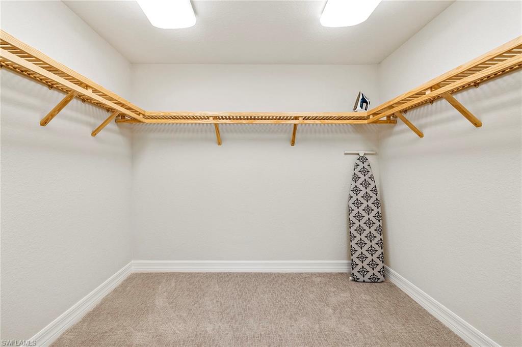 172 Indies Drive East, Unit 101 Naples, FL 34114 - Photo 15 of 33 Master Bedroom Closet